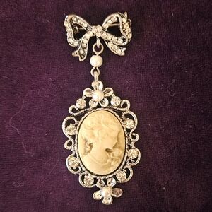 Cameo Brooch with Rhinestones silver toned.